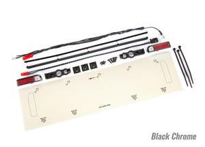 Traxxas LED lights tail lights (red)/ power harness/ tail light housings (left & right)/ tailgate trim (black chrome)/ zip ties (3)