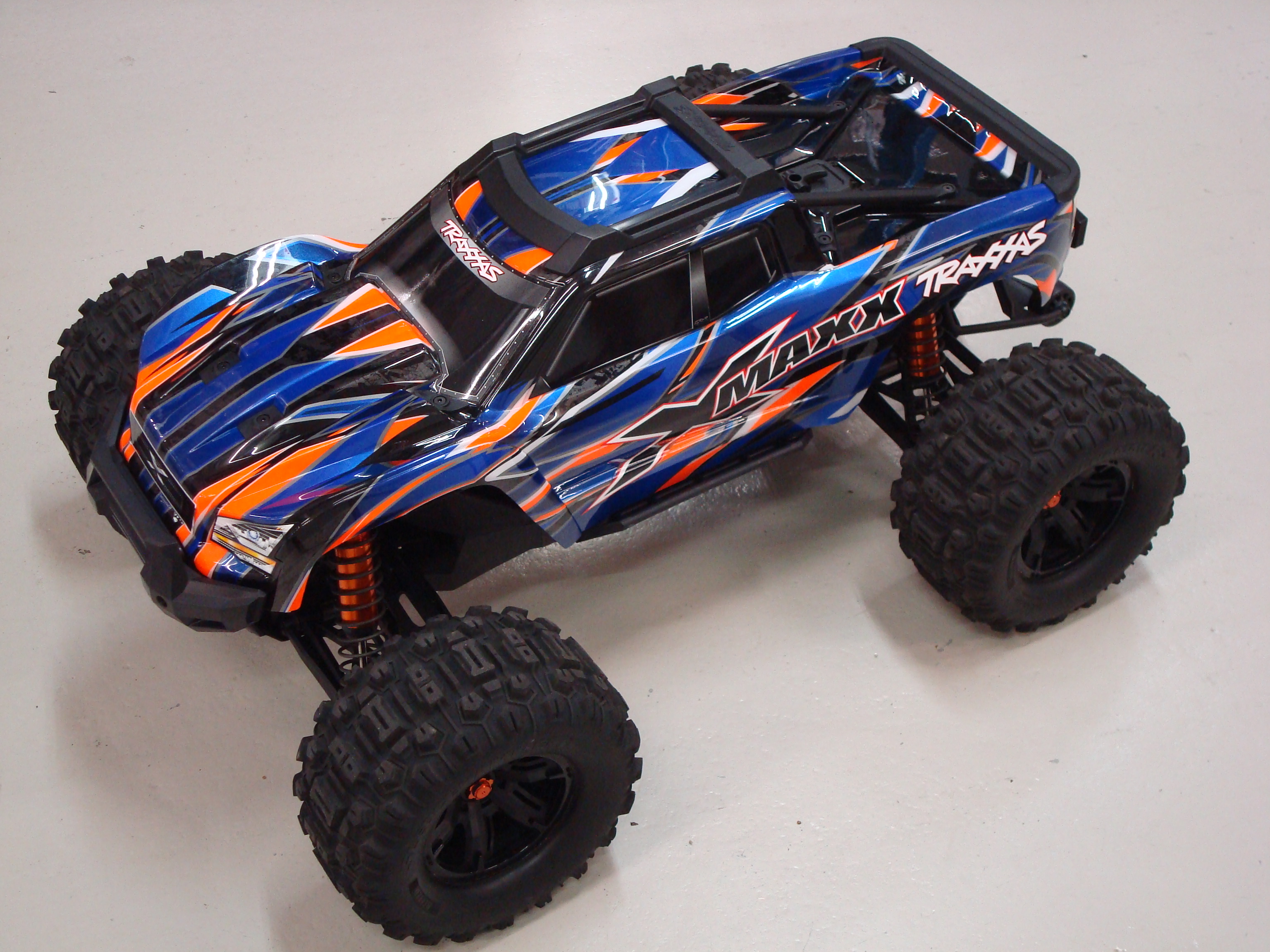 Occasion Traxxas X-Maxx 4WD 8S Belted Brushless Monster Truck RTR TSM 30+ Volts 1/5 Orange