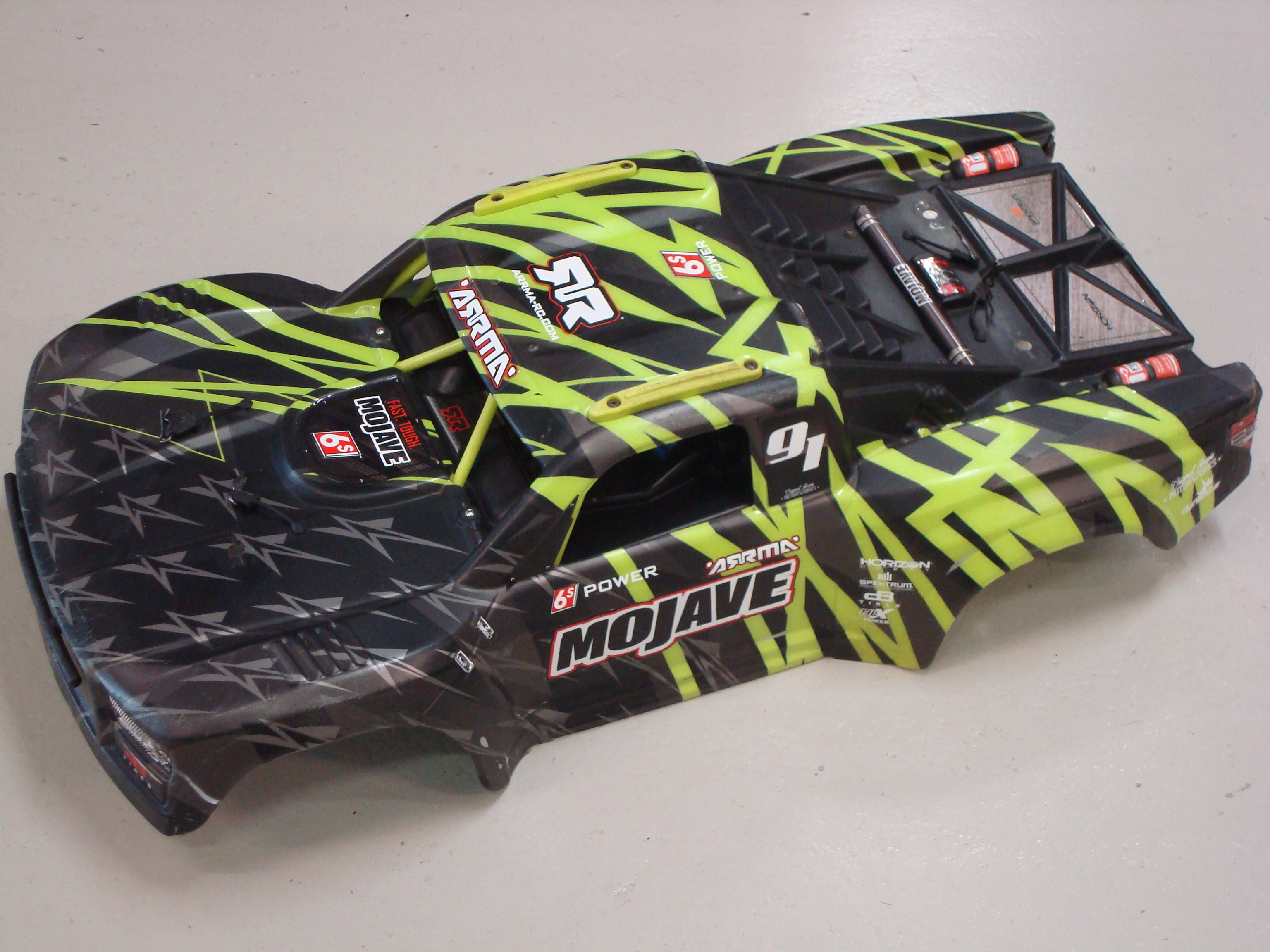 Occasion ARRMA Mojave 6S BLX Painted Complete Body Black/Green 1/7